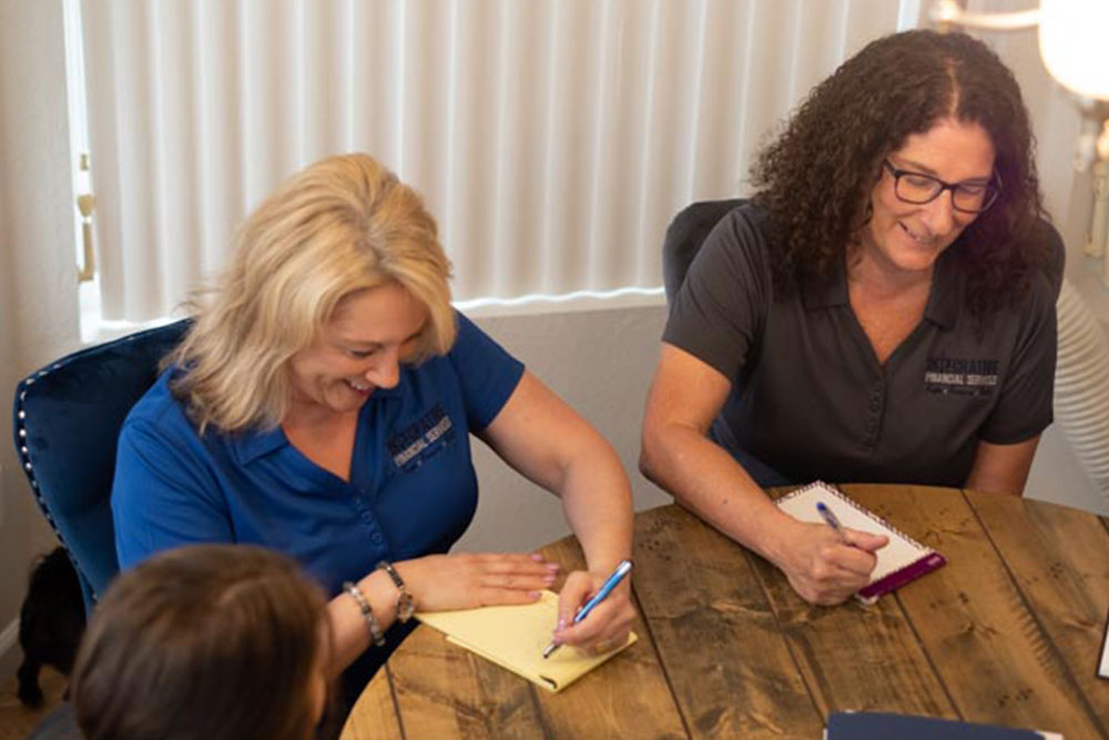 team members in meeting at table